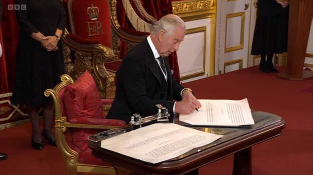 Charles and witnesses sign the oath