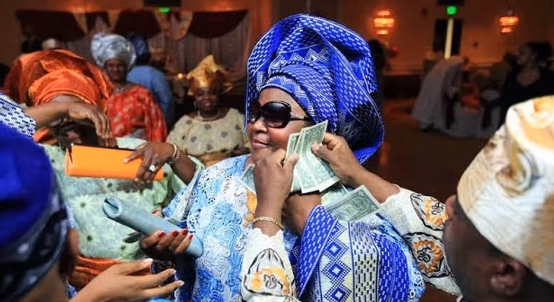 Before you risk it, here's what the law says about spraying of naira notes