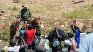 US to investigate reported abuse of Haitian migrants by mounted border patrol