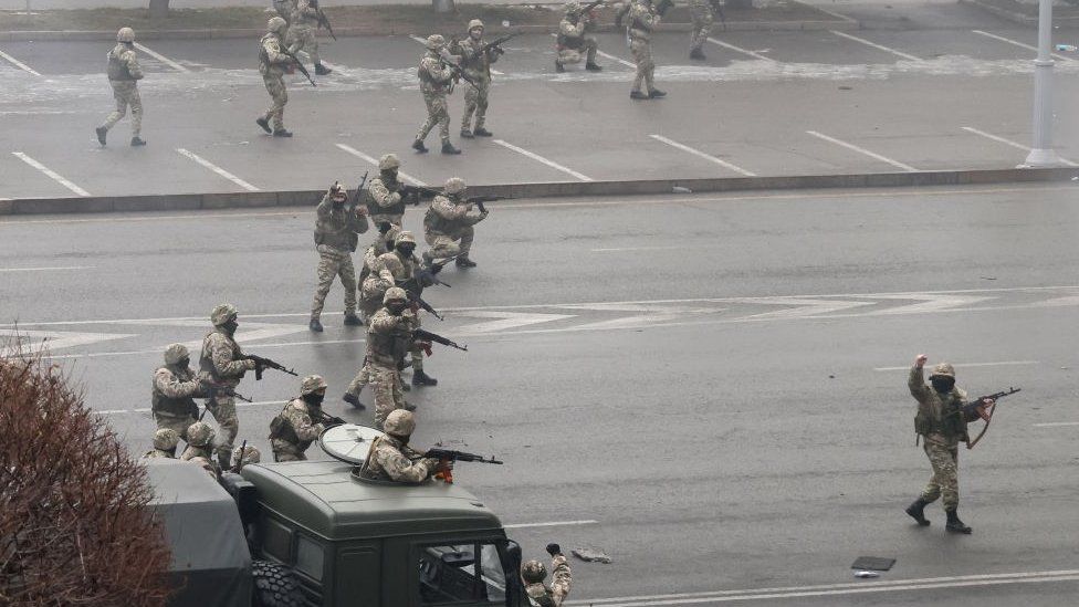 Kazakhstan unrest: Fresh gunfire as president says order largely restored