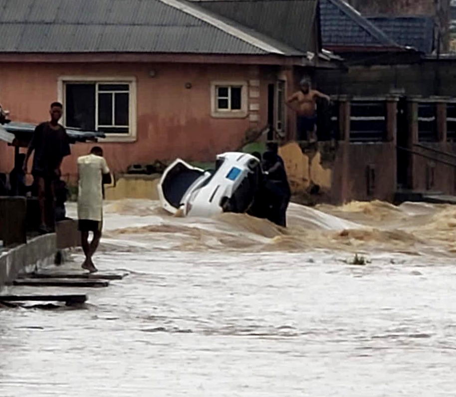 Four rescued, two missing as Lagos flood sweeps away cars