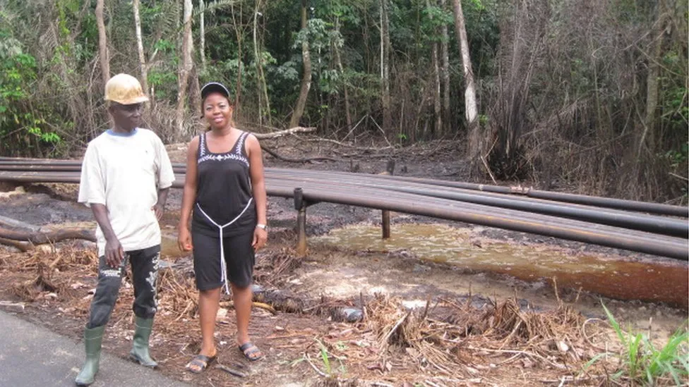 The Nigerian woman cleaning up a land soaked in oil