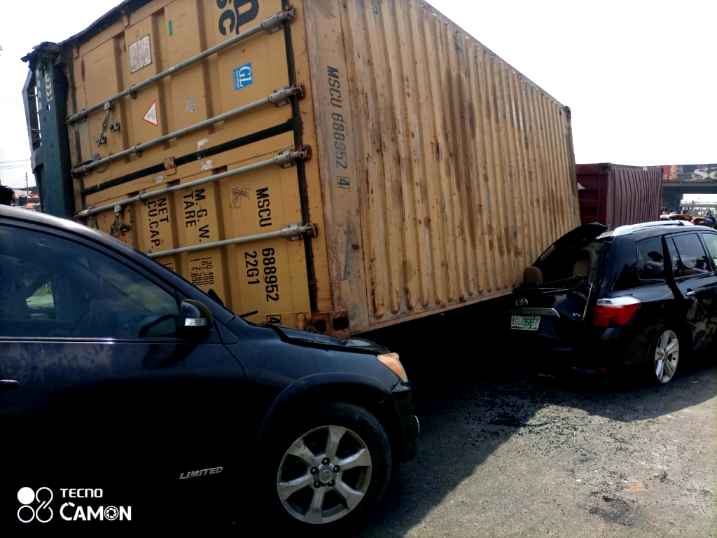 Bus driver dead as 40-feet containers fall on cars in Lagos