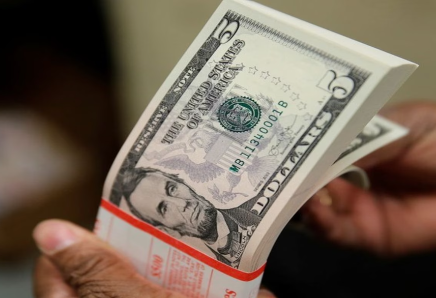 Dollar sinks on yen intervention talk, gold breaks $5,000