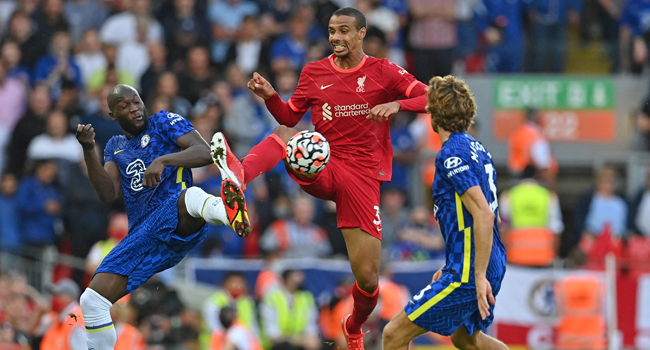 Ten-man Chelsea hold out for 1-1 draw at Liverpool