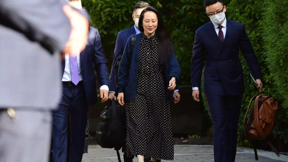 China releases two Canadians held since 2018 as Huawei executive freed in Canada