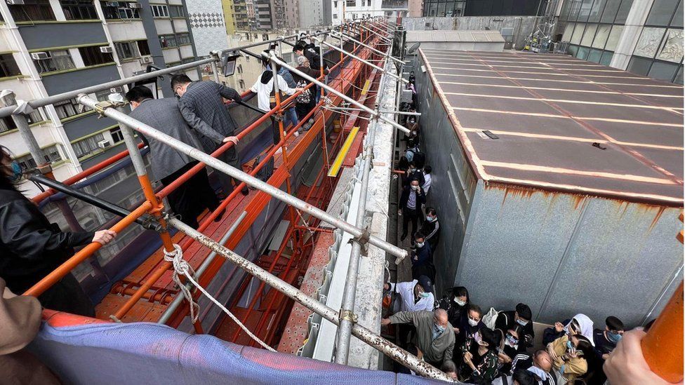 Hong Kong: Fire at World Trade Centre leaves more than 100 trapped on roof