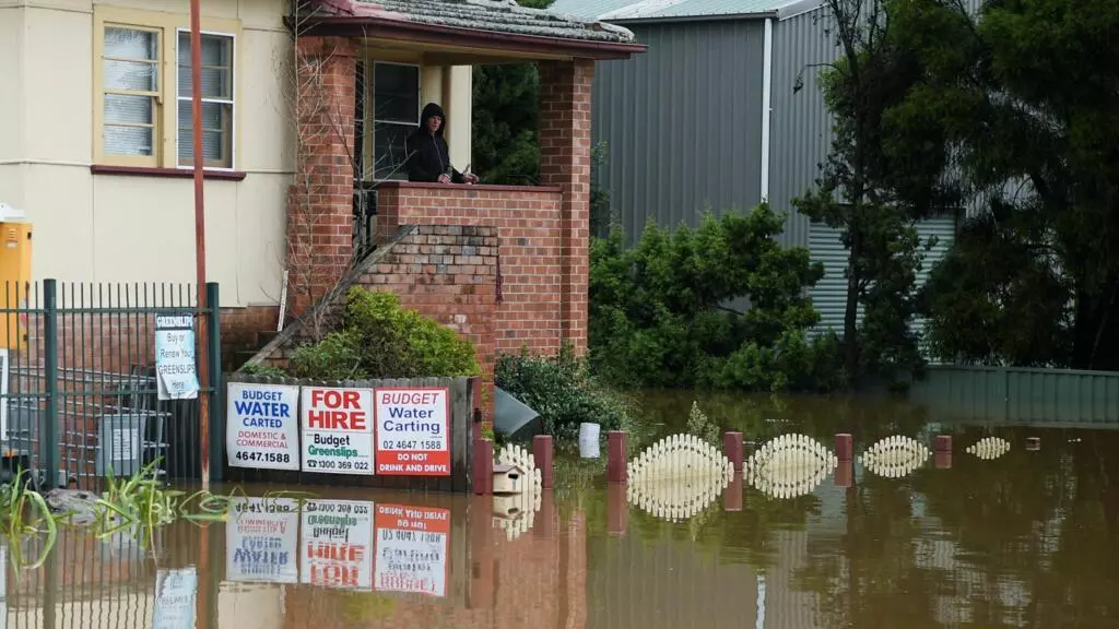 Tens of thousands flee Sydney as Australia's deadly floods continue